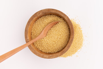 dry couscous isolated on white