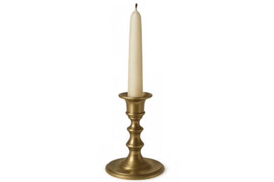 Vintage brass candlestick holding white pillar candle, gleaming against transparent backdrop with minimalist, timeless elegance
