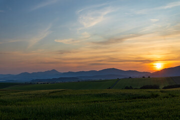 Sunset illuminating rolling hills and mountains in Liptovsky Mikulas, Slovakia