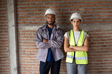Portrait Two Engineer builder. Foreman working in construction site.	
