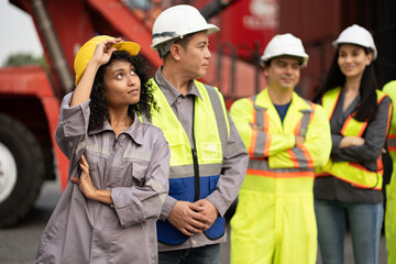 Asia woman with Group of engineer or workers at container site	