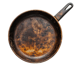Well used frying pan showing age and patina on black background