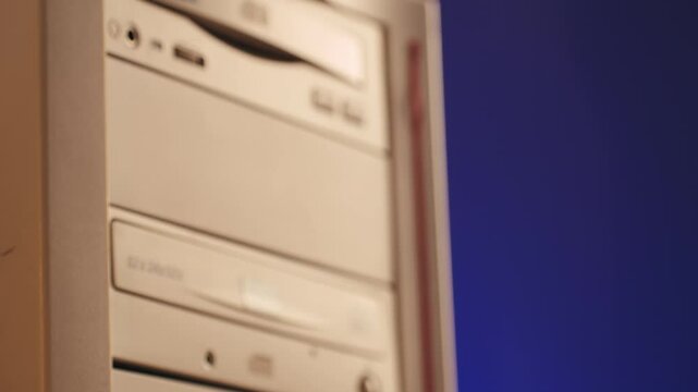 Using CD circle disk for old computer. Dvd player, disc drive. Music recorder, playing retro computer games. 