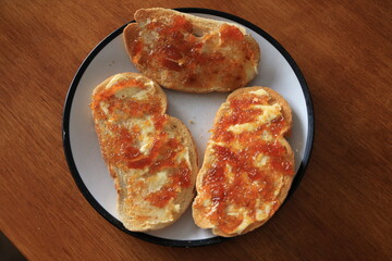 toasts with butter and marmalade