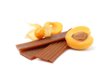 Tasty fruit leather, apricot and physalis isolated on white