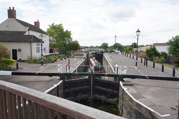 Nottingham, Nottinghamshire, England - June 20 2025: Scenic view of a narrowboat passing through a...