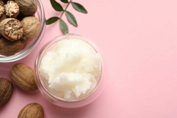 Natural shea butter on pink background, flat lay. Space for text