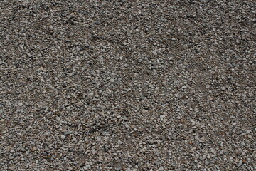 rocks and stones and pebbles texture. smooth pebbles background. variety of smooth, natural rocks with different shapes and textures. Processed collage of sea shore pebbles texture. 