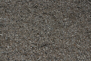 rocks and stones and pebbles texture. smooth pebbles background. variety of smooth, natural rocks with different shapes and textures. Processed collage of sea shore pebbles texture. 