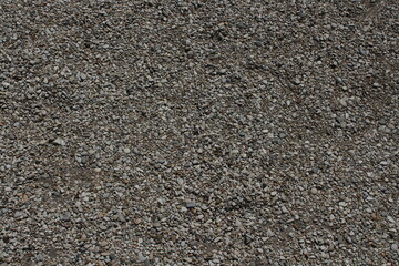 rocks and stones and pebbles texture. smooth pebbles background. variety of smooth, natural rocks with different shapes and textures. Processed collage of sea shore pebbles texture. 