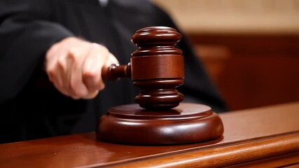 Judge banging gavel in courtroom establishing order and justice - Powered by Adobe