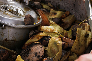 photography of traditional Peruvian food called Pachamanca. Food concept.