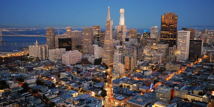 San Francisco - Aerial Pullback From Skyline at Blue Hour with Glowing City Lights in ProRes