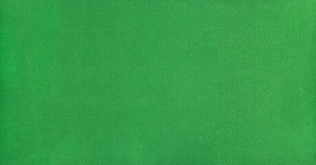 Smooth billiard cloth texture in green, close-up surface view