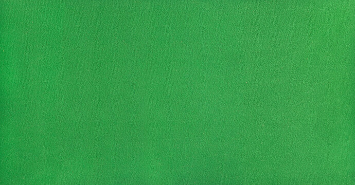 Smooth billiard cloth texture in green, close-up surface view