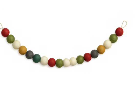 Festive felt ball garland with alternating colors adding a touch of handmade charm, isolated on a transparent background