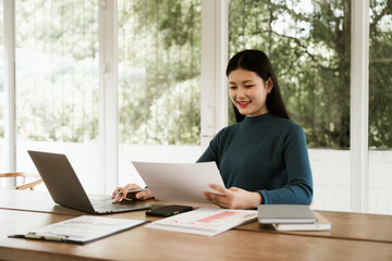 Young Woman Working at Home Office