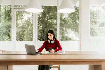 Woman Working at Home with Laptop