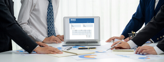 Invoice on computer screen from accounting application. Computer program for financial and budget...