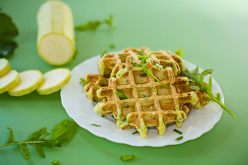 Crispy vegetable waffles served with herbs