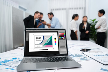Graphic designer software for modern design of web page and commercial brisk ads showing on the...