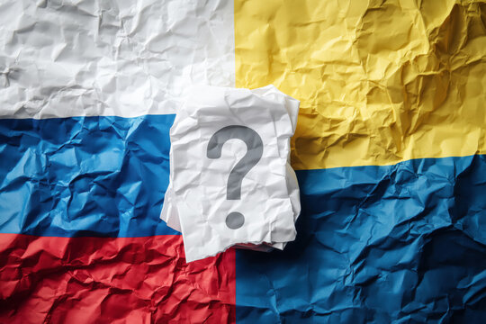 Geopolitical tension depicted with crumpled paper flags of Russia and Ukraine, reflecting conflict and uncertainty. - Powered by Adobe