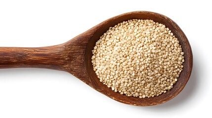 Wooden spoon filled with quinoa seeds, a healthy and nutritious food option