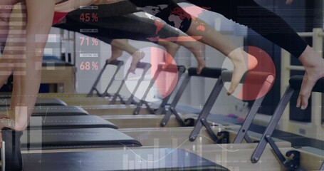 Two women gripping reformer bars and pulsing into plank, showing live fitness metrics overlays - Powered by Adobe