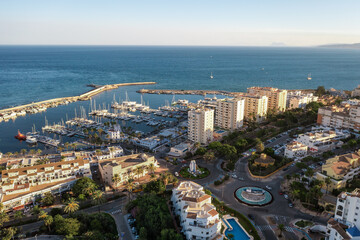 Aerial view of a large urban park in Estepona, surrounded by residential buildings and overlooking...