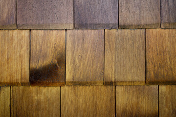 Weathered wooden shingles with natural texture