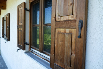 Wooden shutters on a country house 