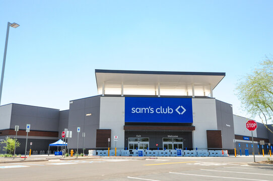 Exterior view of a new Sam&rsquo;s Club wholesale retail warehouse featuring the main entrance, brand signage, and shopping cart area prior to opening for customer operations