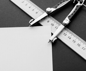 Circinus, compasses and wooden measuring rulers	