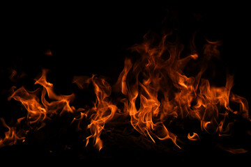 Texture of fire on a black background. Abstract fire flame background, large burning fire.