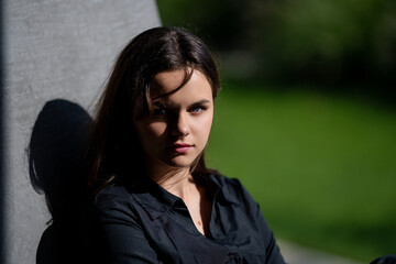 Trendy teen girl outdoor. Street style of a young teen model. Portrait of hipster teen girl in...