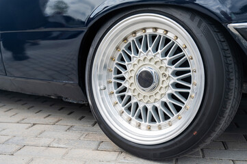 Close-Up of Custom Car Wheel and Tire Excellence. 