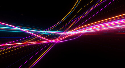 Abstract glowing light trails in pink, blue, and yellow moving at high speed on a black background. Concept of technology, data transfer, and motion.
