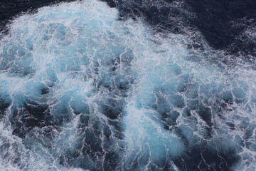 Aerial View of Ocean Waves and Foam