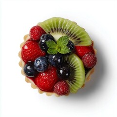 Obraz premium Glazed fruit tart with kiwi, berries and mint. Top view