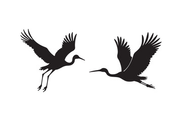 Cranes in flight against a white background