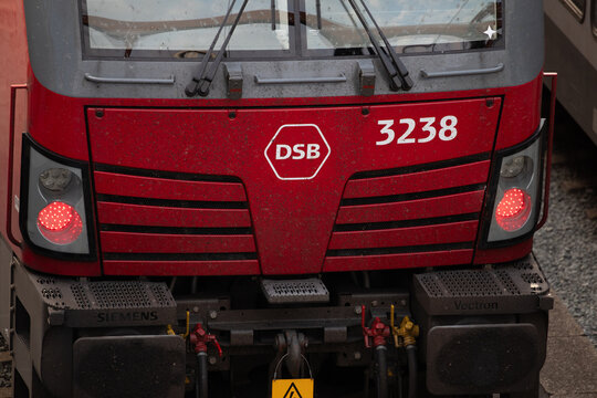 Naestved, Denmark, July 14 2023 - Close up of red and dirty DSB Train