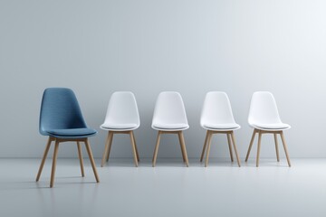 Unique blue chair amidst row of white chairs in minimalist setting