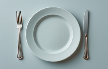 Fototapeta na wymiar Highlighting food insecurity with an empty plate and utensils on a neutral background