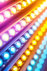 Colorful LED lights arranged in diagonal rows, emitting vibrant hues of blue, yellow, and orange. Bright, electrifying illumination