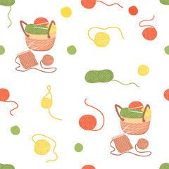 Knitting seamless pattern with skeins of yarn, basket with threads, knitting needles and knitwear. Green, yellow, red, brown colors on white background. Vector cartoon design for textile, wallpaper.