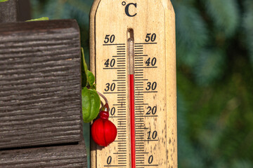 Wooden mercury thermometer, measuring temperature in the orchard,