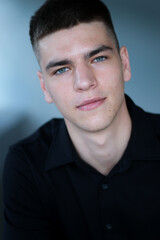 Portrait of young handsome man expressing different emotions. High quality photo