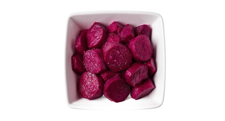 Sliced beets in a white bowl overhead shot