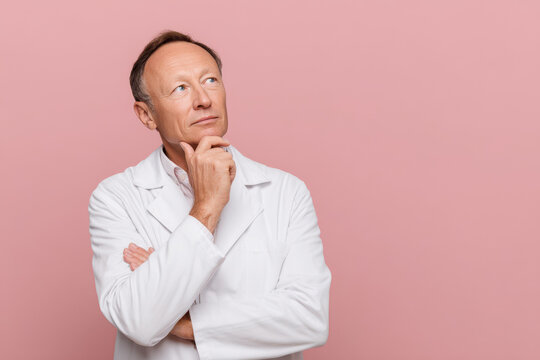 portrait of focused endocrinologist deeply contemplating patient
