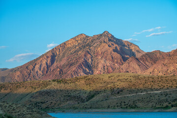 Mountain landscape with blue sky.